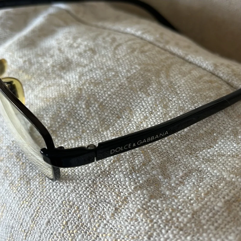 - Dolce and Gabbana black wire frame glasses